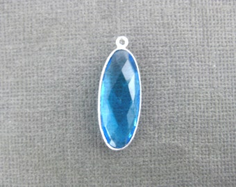 Pendentif ovale topaze bleue -26 mm x 10 mm lunette argentée- Pendentif (PG-038)