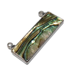 May include: A silver-toned rectangular pendant with a green, blue, and white abalone shell inlay. The pendant has two loops on the top and bottom for attaching to a chain or cord.