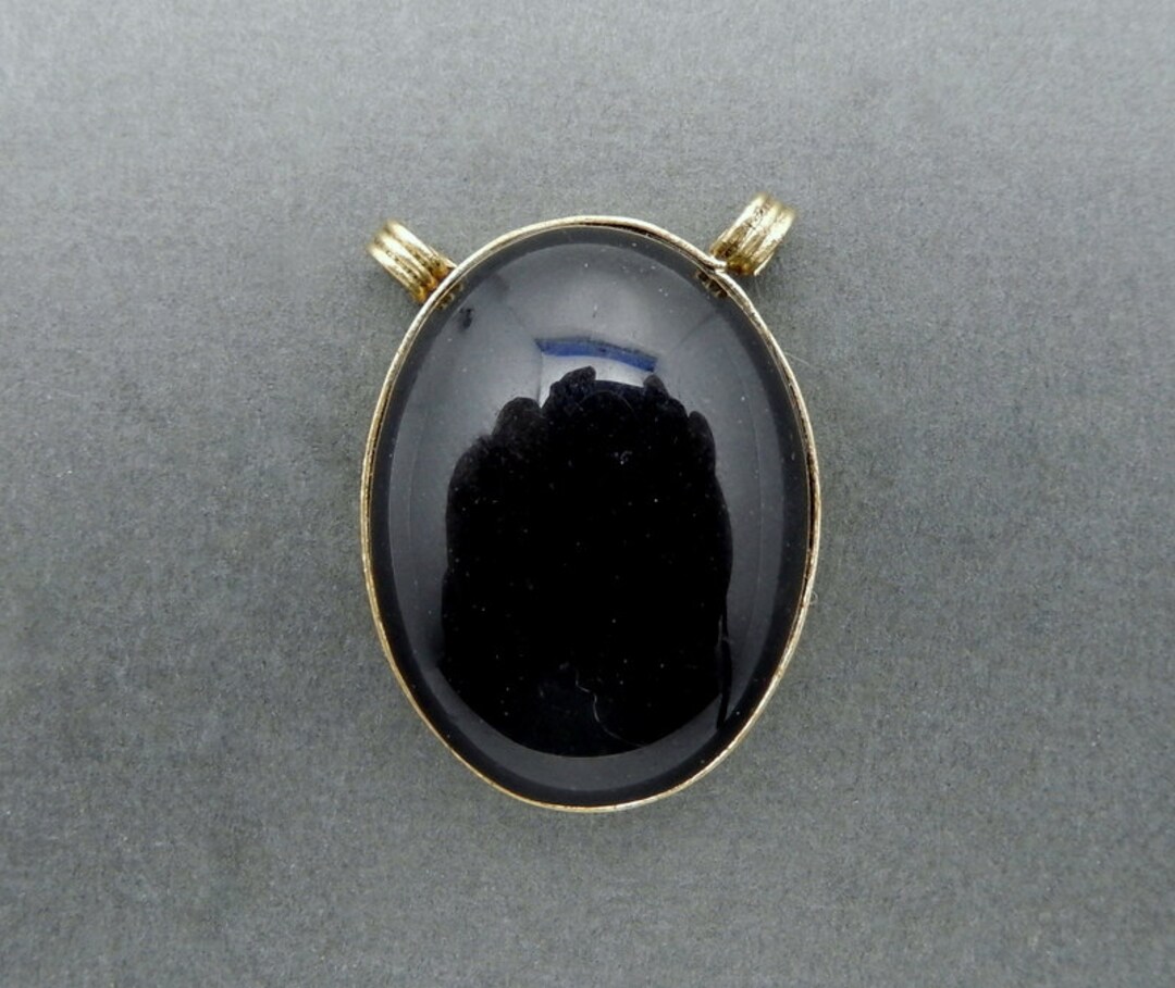 Black Colored Oval Double Bail Pendant With Brass Edge and