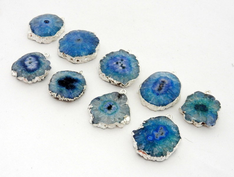 S85B5-02 Blue Dyed Solar Quartz Rounded Pendant with Electroplated Silver Edge