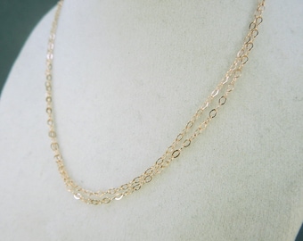 Cadena de relleno de oro rosa de 14 k, cable plano de 20" con acabado de 1,3 mm