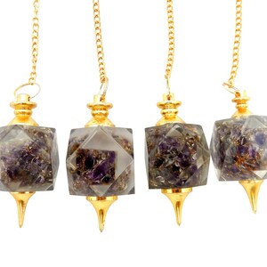 May include: Four gold-toned pendulums with amethyst crystal points. Each pendulum has a faceted, clear glass cube with amethyst crystals inside.