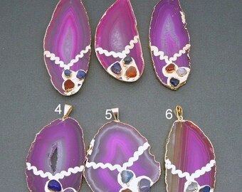 May include: Six agate pendant charms with gold accents and various colored gemstones. Each pendant features a different arrangement of gemstones, including red, orange, yellow, green, blue, and purple.