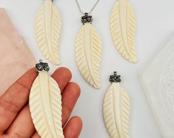 White Carved Boned Feather Pendant