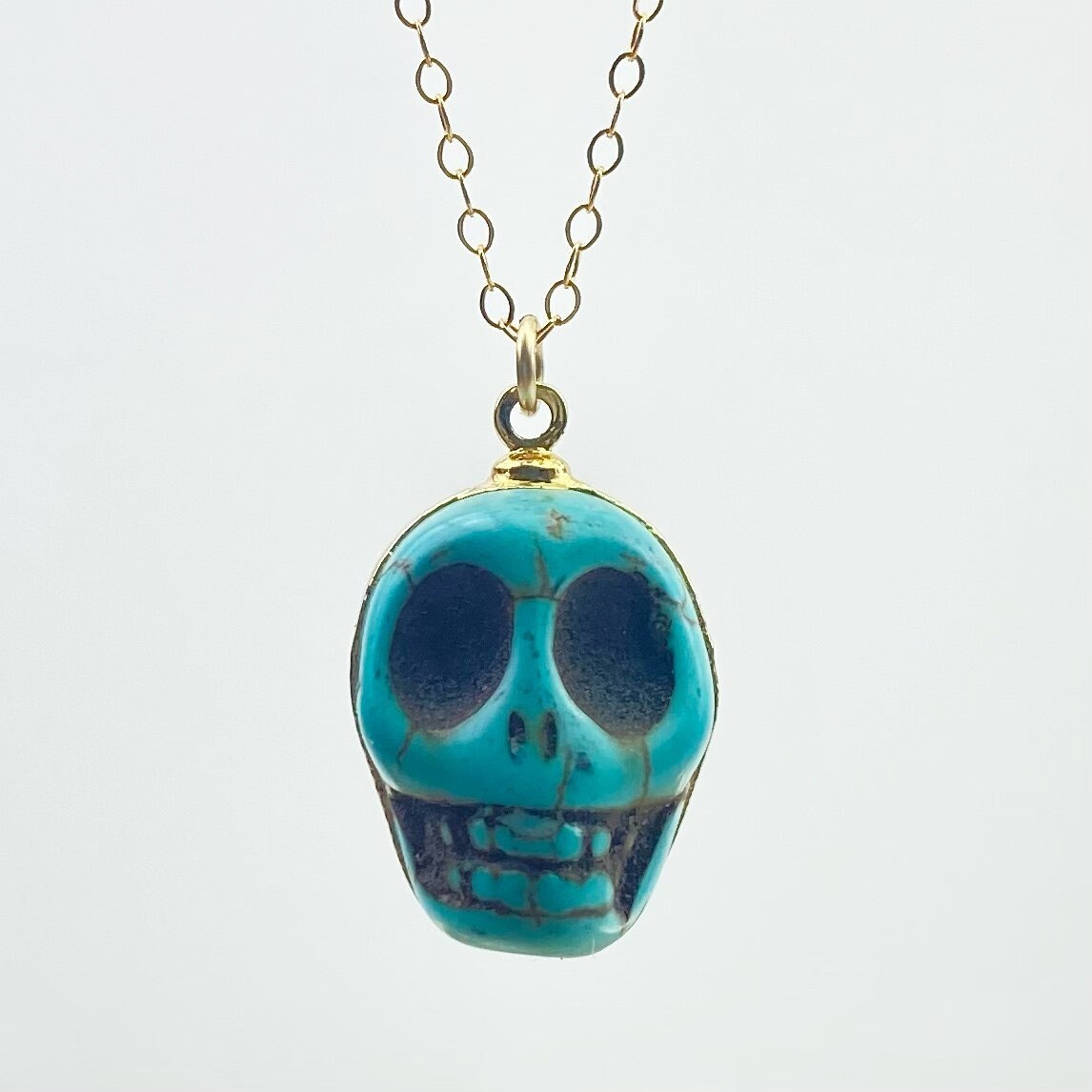 Turquoise skull necklace deals