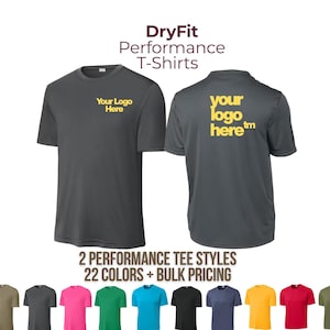 May include: Two dark gray short-sleeve performance t-shirts featuring the yellow text Your Logo Here on the front left chest and a larger version on the back. The image includes the text DryFit Performance T-Shirts and 22 colors + bulk pricing.