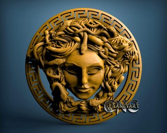 May include: A gold-coloured, circular relief sculpture of Medusa's head, with detailed depiction of her hair and snakes. The sculpture is framed by a Greek key border and the text "PLANETART" is visible.