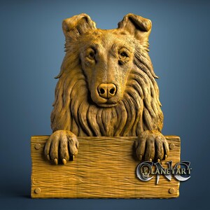 May include: A detailed wooden sculpture of a dog's head and upper body, with paws resting on a wooden plank. The sculpture is a warm, golden brown colour, with intricate carvings depicting fur and facial features. The plank has the text "PLANET ART".