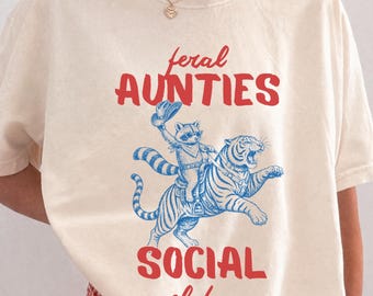 野性的な叔母さんたちの社交クラブTシャツ、面白い新米叔母さんへのギフト、レトロな虎柄Tシャツ、誰かの野性的な叔母さん、妹の赤ちゃんが将来の叔母さんを発表