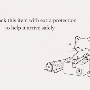 May include: A black and white line drawing of a cat taping a cardboard box with a roll of bubble wrap nearby. The text reads: We pack this item with extra protection to help it arrive safely. The box features a small label with the word FRAGILE.