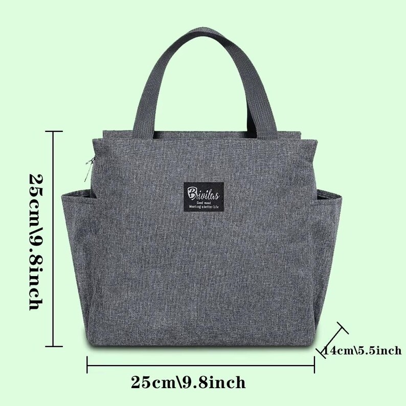 May include: Gray insulated lunch bag with a top handle and side pockets. The bag is 9.8 inches wide, 9.8 inches tall, and 5.5 inches deep. The bag has a small label that reads "Brivilas" and "Meeting better life".