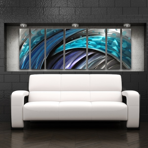 May include: A white leather sofa sits in front of a wall with a modern abstract art piece. The art piece is made up of six panels, each with a different design of blue, silver, and purple swirls. The panels are arranged in a horizontal row.