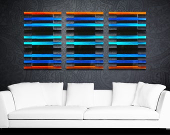 May include: Three rectangular wall art pieces with a modern abstract design. Each piece features horizontal stripes in shades of blue, turquoise, and orange against a black background.