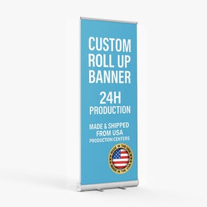 May include: A custom roll-up banner with a light blue background. The banner features white text that reads "CUSTOM ROLL UP BANNER 24H PRODUCTION." It also includes a graphic of the American flag and states "MADE IN THE USA."