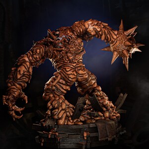 May include: A detailed, brown monster figurine with a textured, organic appearance. The figure has spiky protrusions on one arm and stands on a wooden platform. The image includes text that reads "PRESUPPORT READY 1-6 SCALE" and "AVAILABLE ON PATREON."