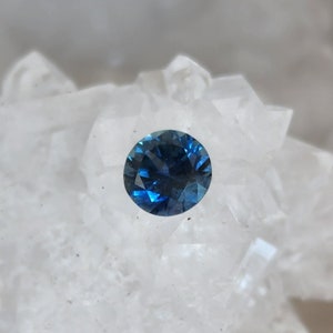 Montana Sapphire .78 CT Dark Teal Round Cut