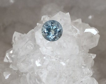 Montana Sapphire 1.22 Carat Light Blue with Peach Center Round Brilliant