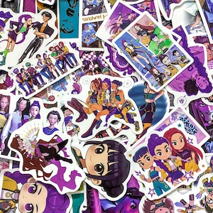 May include: A collection of assorted vinyl stickers featuring anime-style illustrations of characters with vibrant purple, yellow, and green clothing. The designs include various group poses, individual portraits, and chibi-style figures with stars and text.