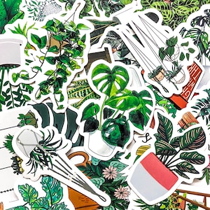 May include: A collection of die-cut stickers featuring various potted houseplants, including a trailing pothos in a hanging basket, a monstera in a white pot, and a plant with dark green leaves in a two-toned pink and white pot, all with white borders.