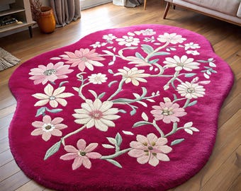 Magentaroze bloemenvloerkleed onregelmatige vorm - getuft modern botanisch woonkamerdecor