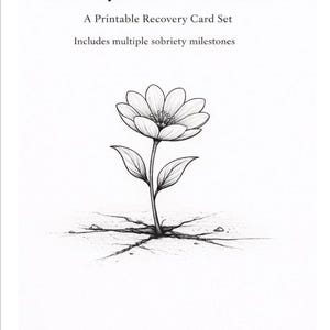 May include: A black and white illustration of a flower emerging from cracked ground, with the text "Sobriety Milestone Cards" and "A Printable Recovery Card Set." The image also includes the text "Includes multiple sobriety milestones" and "Hueberry Art Co."
