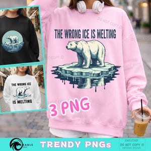 Puede incluir: Sudadera rosa con un oso polar sobre un iceberg y el texto "THE WRONG ICE IS MELTING". La imagen también incluye el texto "3 PNG" en rosa. También hay ejemplos en sudaderas negras y blancas.