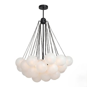 May include: A modern chandelier featuring a cluster of frosted white globe lights suspended from a black metal frame. The fixture has a central stem and multiple chains, creating a unique lighting design. The overall shape is a downward-facing cone.