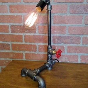 Angled pipe lamp Features a unique and functional faucet handle on/off switch Includes 60 watt bulb image 2
