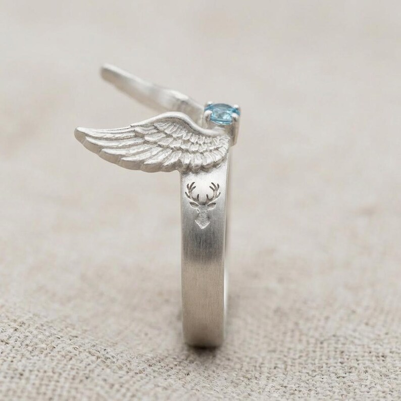 May include: A rustic wooden sign with the text "Welcome to our home" in white lettering. The sign features a distressed finish and a simple, inviting design, perfect for a front porch or entryway.