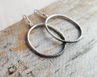 Oval Stardust Earrings. Oval Frame Earrings. Stardust Earrings. Oval Dangle Earrings. Everyday Earrings. Textured Silver Earrings