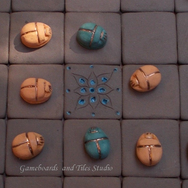 Egyptian Seega Game Board , brown tiles and turquoise motifs with scarab pawns in green and yellow- earth colors, - 14 x 14 cm wood base