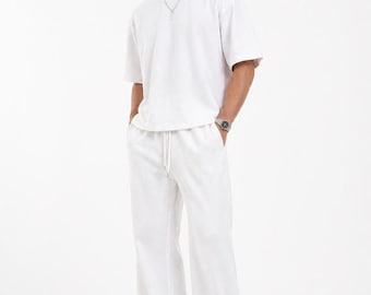 Conjunto blanco de dos piezas extragrande, ropa de estar por casa minimalista, pantalones de pierna ancha, camiseta de corte recto.