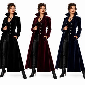May include: A long-sleeved, floor-length velvet coat featuring a high collar, a double-breasted front with silver-toned buttons, and side pockets. The coat is displayed in three distinct colours: black, deep burgundy, and dark navy blue.