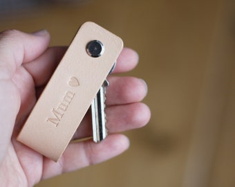 Handmade minimalist design leather key holder. Personalised key pouch.