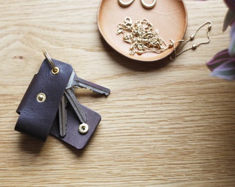 Handmade minimalist design leather key holder. Personalised key pouch.