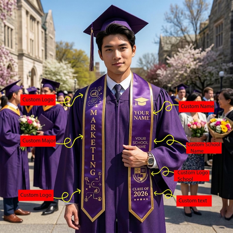 May include: A graduate in a purple cap and gown with a gold sash that says "MARKETING" and "CLASS OF 2026". The sash also has the text "YOUR NAME" and "YOUR SCHOOL NAME". Other graduates are in the background.