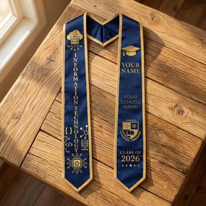 May include: Navy blue graduation sash with gold text and accents. The sash features the words "INFORMATION TECHNOLOGY" and "YOUR NAME" along with a graduation cap and the year "2026".