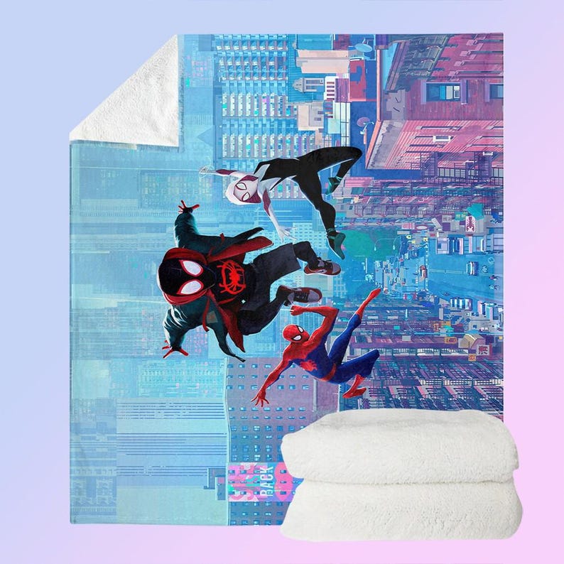 May include: A plush, white sherpa blanket featuring a vibrant illustration of Spider-Man characters in action against a cityscape backdrop. The blanket showcases Spider-Man, Spider-Gwen, and Miles Morales in dynamic poses, with a soft, white sherpa backing.