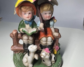 Vintage Hummel Style Porcelain Figurine Boy Girl Under Umbrella Fence Dogs China
