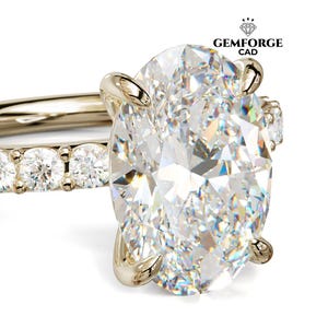 May include: A gold ring with a large, oval-cut diamond as the focal point. The band is embellished with smaller diamonds. The ring is displayed against a white backdrop, emphasizing its sparkle. The Gemforge CAD logo is visible in the top right corner.