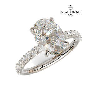 May include: A diamond engagement ring featuring an oval-cut central stone. The white metal band is set with smaller diamonds. The ring is displayed against a white backdrop. The Gemforge CAD logo is visible in the top right corner.