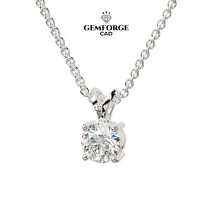 May include: A silver necklace with a round, brilliant-cut diamond pendant. The diamond is set in a four-prong setting and hangs from a delicate chain. The necklace is displayed against a white background. The text "GEMFORGE CAD" is in the upper right.