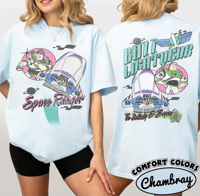 May include: A light blue t-shirt featuring Buzz Lightyear graphics. The front displays Buzz Lightyear, a spaceship, and the text Space Ranger. The back shows Buzz Lightyear, a spaceship, the text Buzz Lightyear, and To Infinity & Beyond.