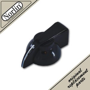 May include: A black plastic control knob featuring a tapered pointer design with a thin white indicator line. The knob has a smooth, glossy finish and a circular base. The Norlin logo and the text original replacement parts are visible.