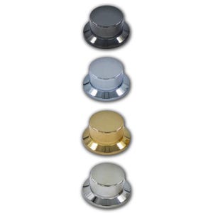 May include: Four metallic knobs in a row, each with a different finish: dark gray, silver, gold, and light silver. The knobs have a cylindrical top with a ridged texture and a flared base.