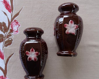 Set of salt and pepper shakers Japan brown ceramic with pink flowers and basket weave cork stoppers mid century