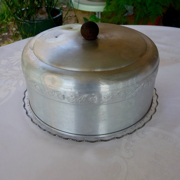 Vintage cake plate with domed cover clear Federal glass three toed footed cake plate aluminum top cover wood acorn knob