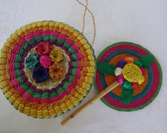 Folk art raffia woven basket with attached lid hand fan bright colors flowers twelve palm leaf fiesta decorations hecho en Mexico