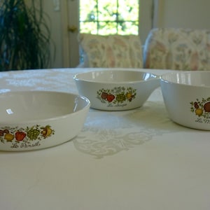 May include: A rustic wooden sign with the text "Welcome to our home" in white lettering. The sign features a distressed finish and a simple, inviting design, perfect for a front porch or entryway.