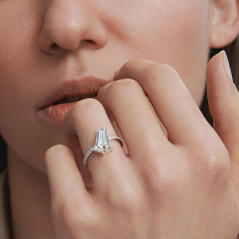 Handcrafted kite shaped diamond ring in yellow gold, perfect for engagements and special occasions